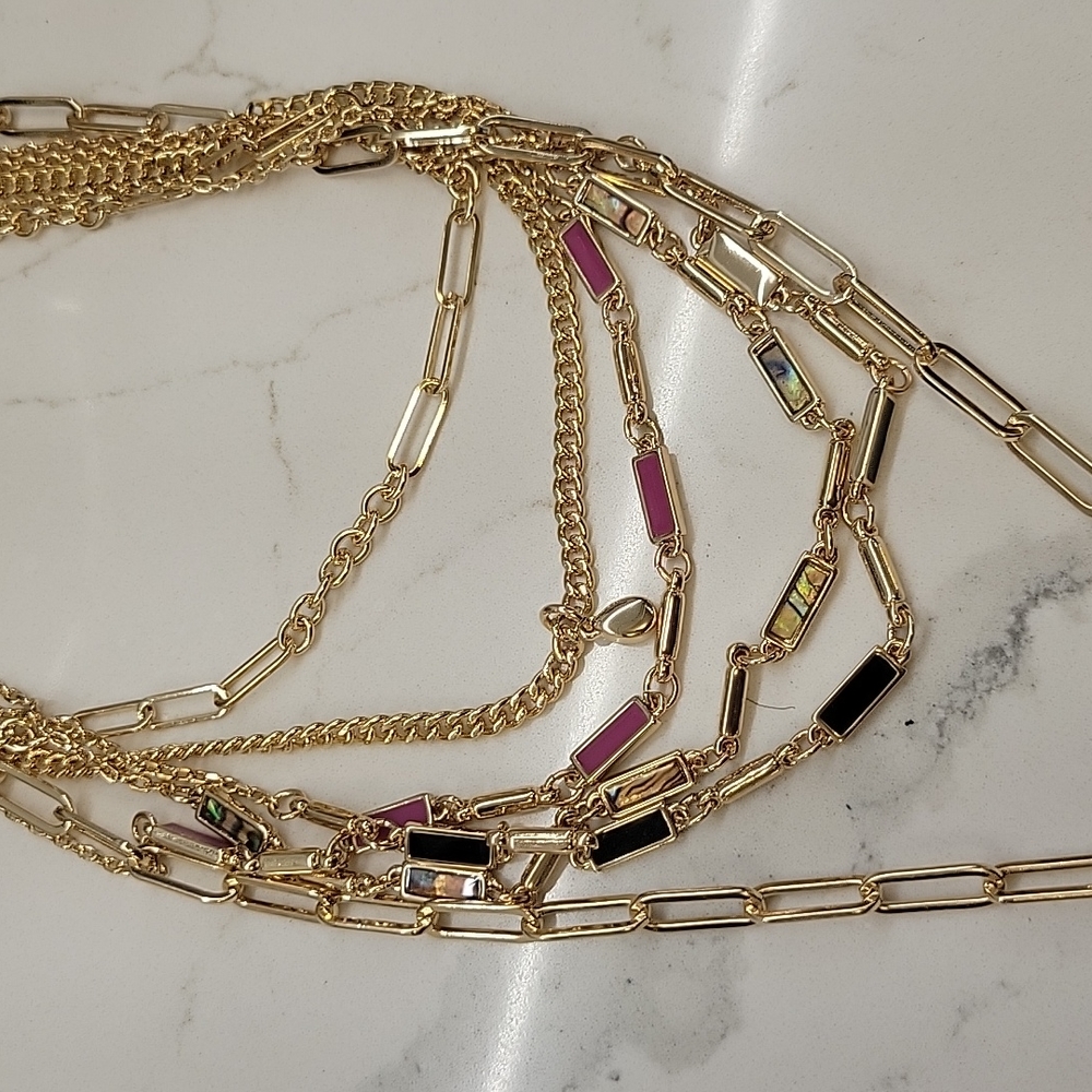 NWT WHBM Gold tone multi layer necklace with multi colored stones.